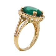 Oval Cut Emerald Ring - With Diamond Halo